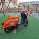 Оранжевый мопед в баре Соль на Профсоюзной 0